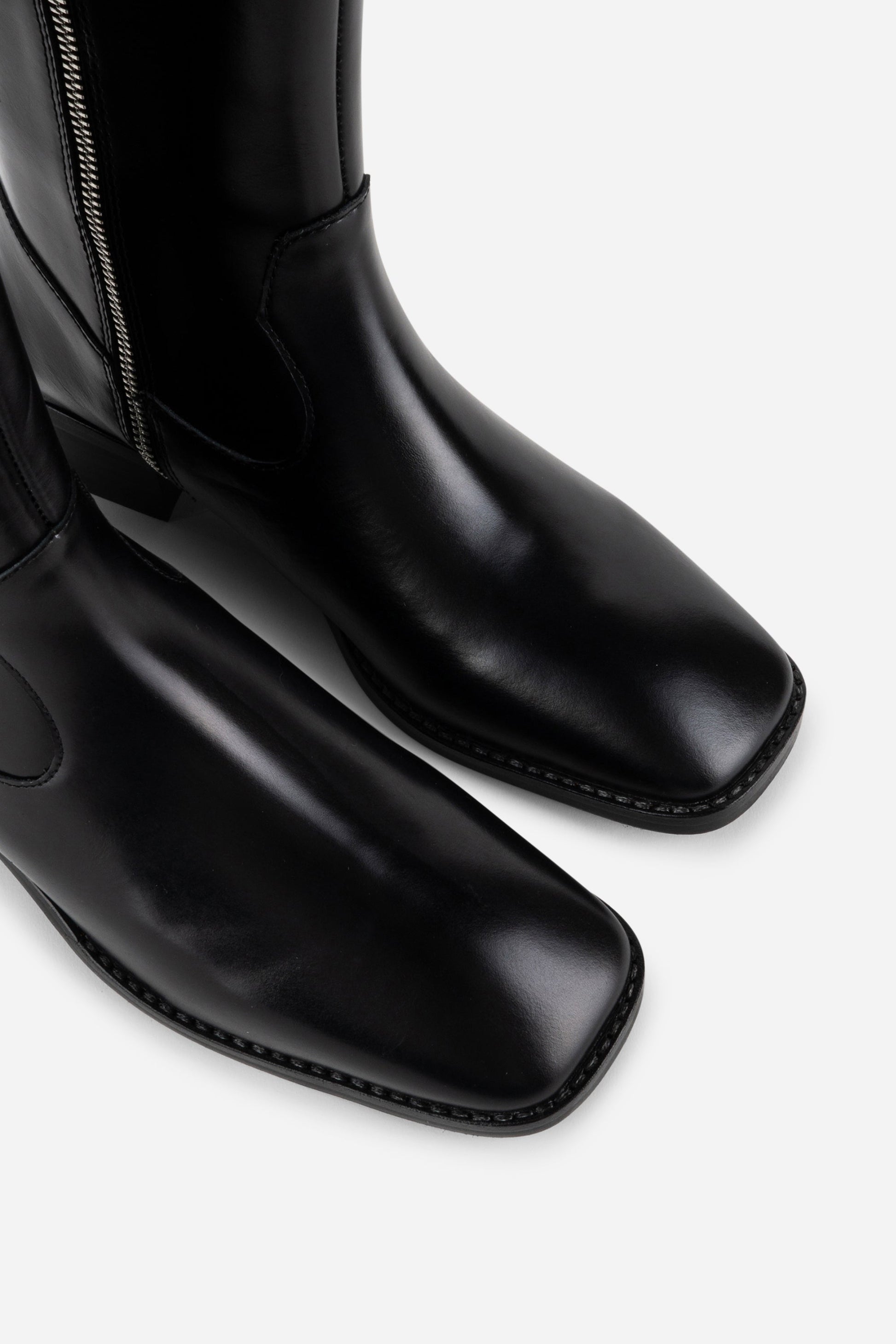 Intentionally Blank TAME KNEE HIGH BOOT