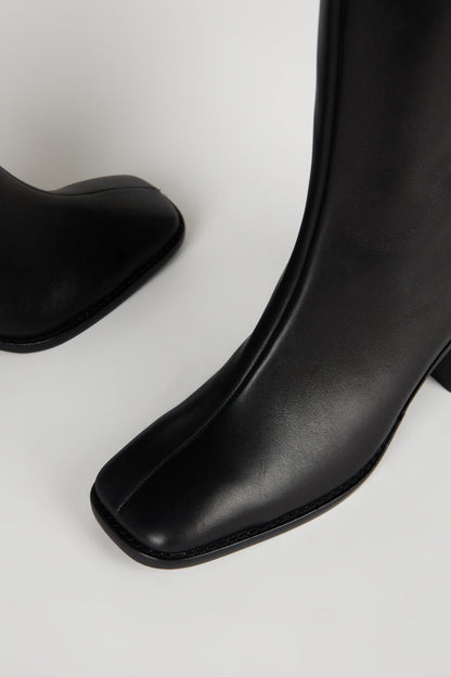Intentionally Blank CONTOUR BOOT