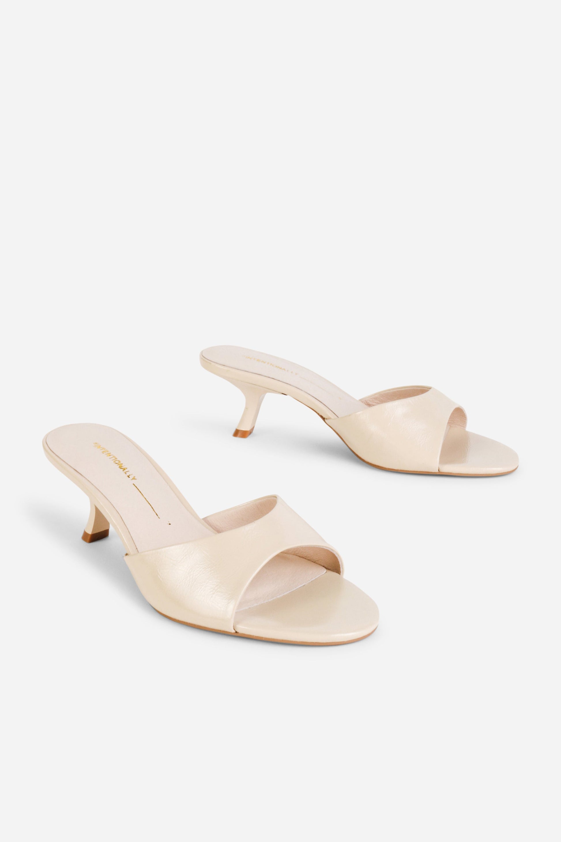 Intentionally Blank GIVEN MULE HEEL