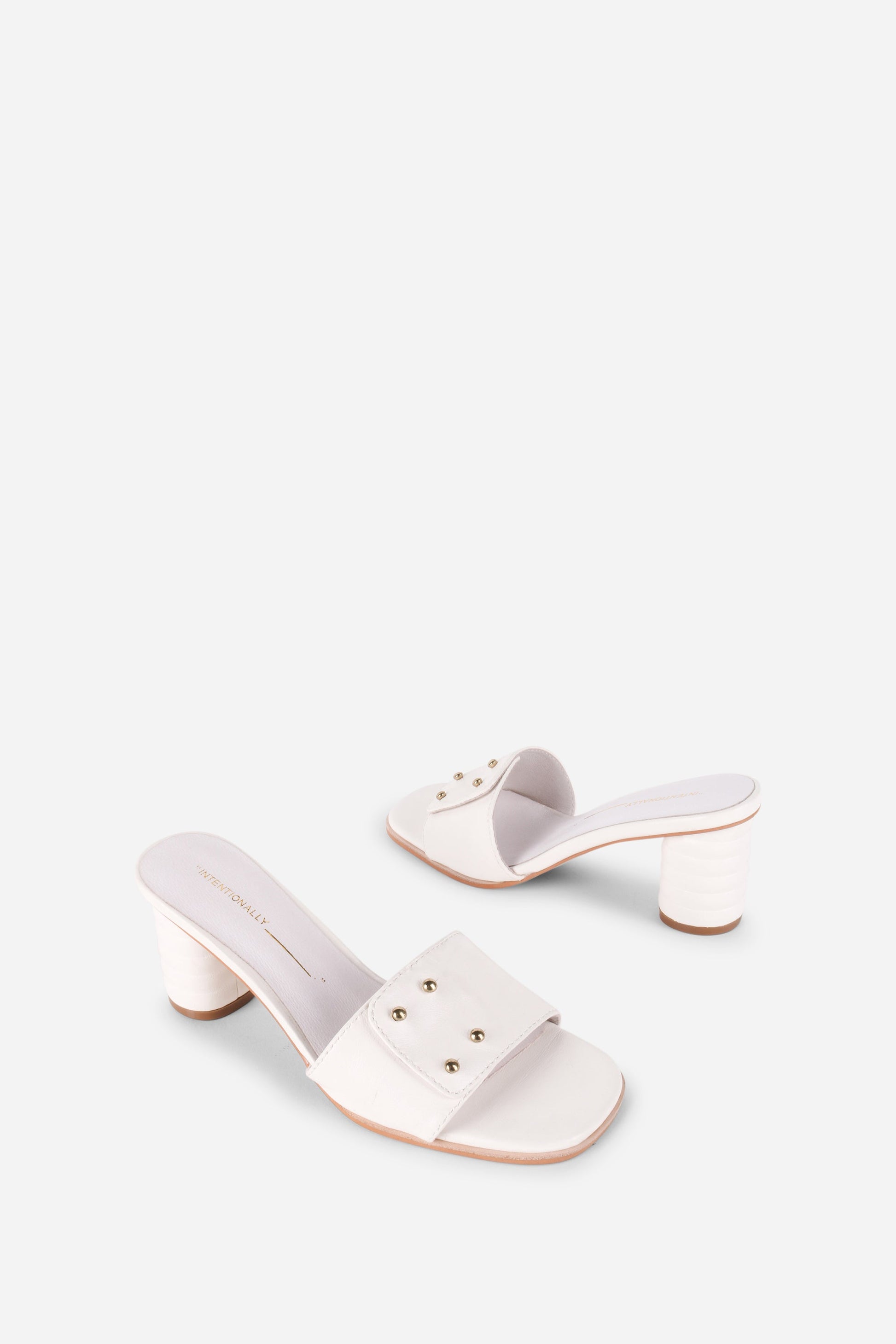 Intentionally Blank KIZMIT MULE HEEL