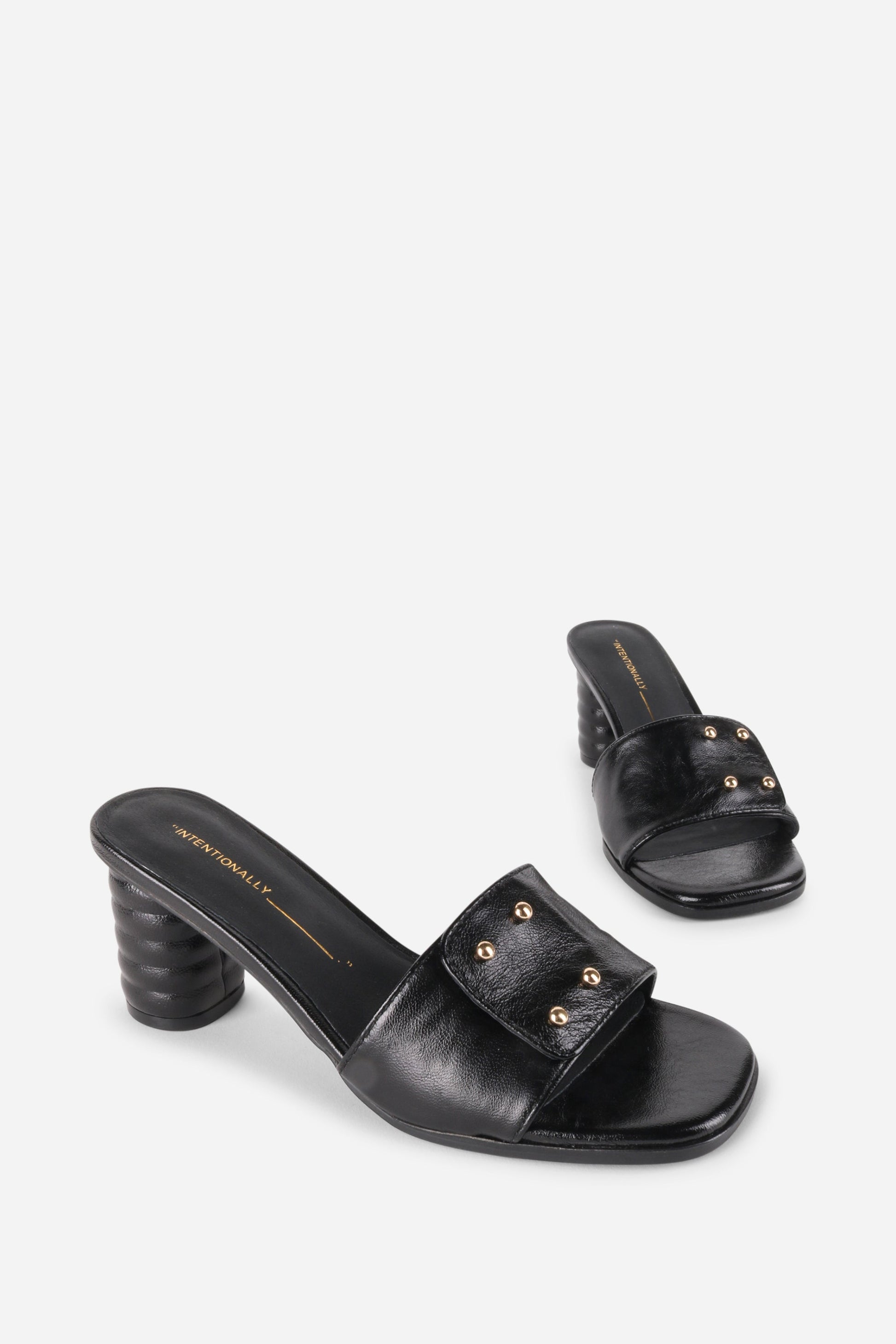 Intentionally Blank KIZMIT MULE HEEL