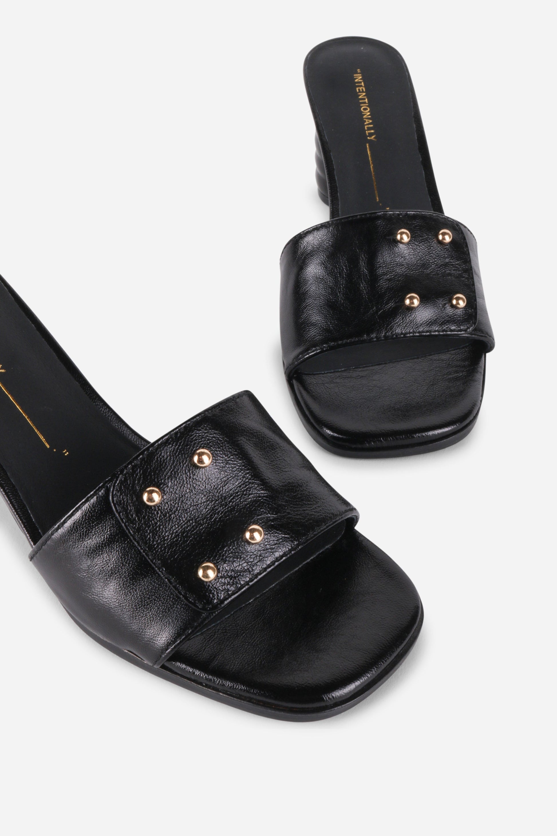 Intentionally Blank KIZMIT MULE HEEL