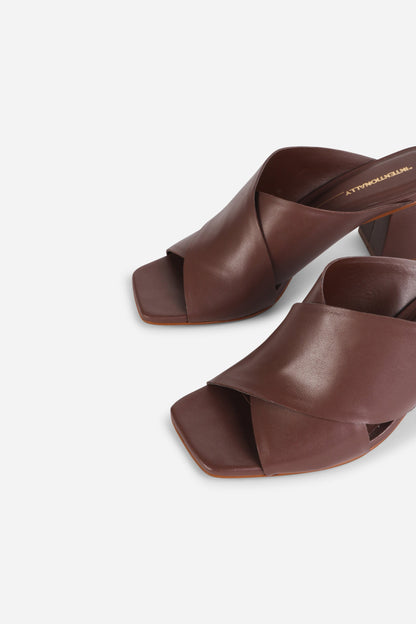 Intentionally Blank LEFTY MULE HEEL