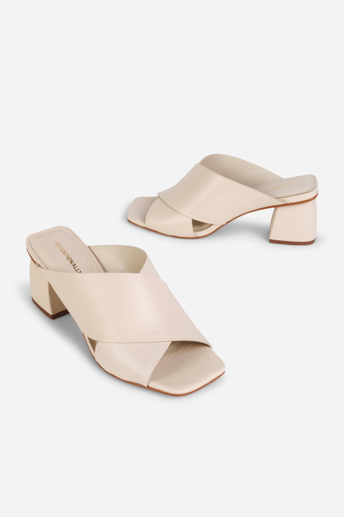 Intentionally Blank LEFTY MULE HEEL