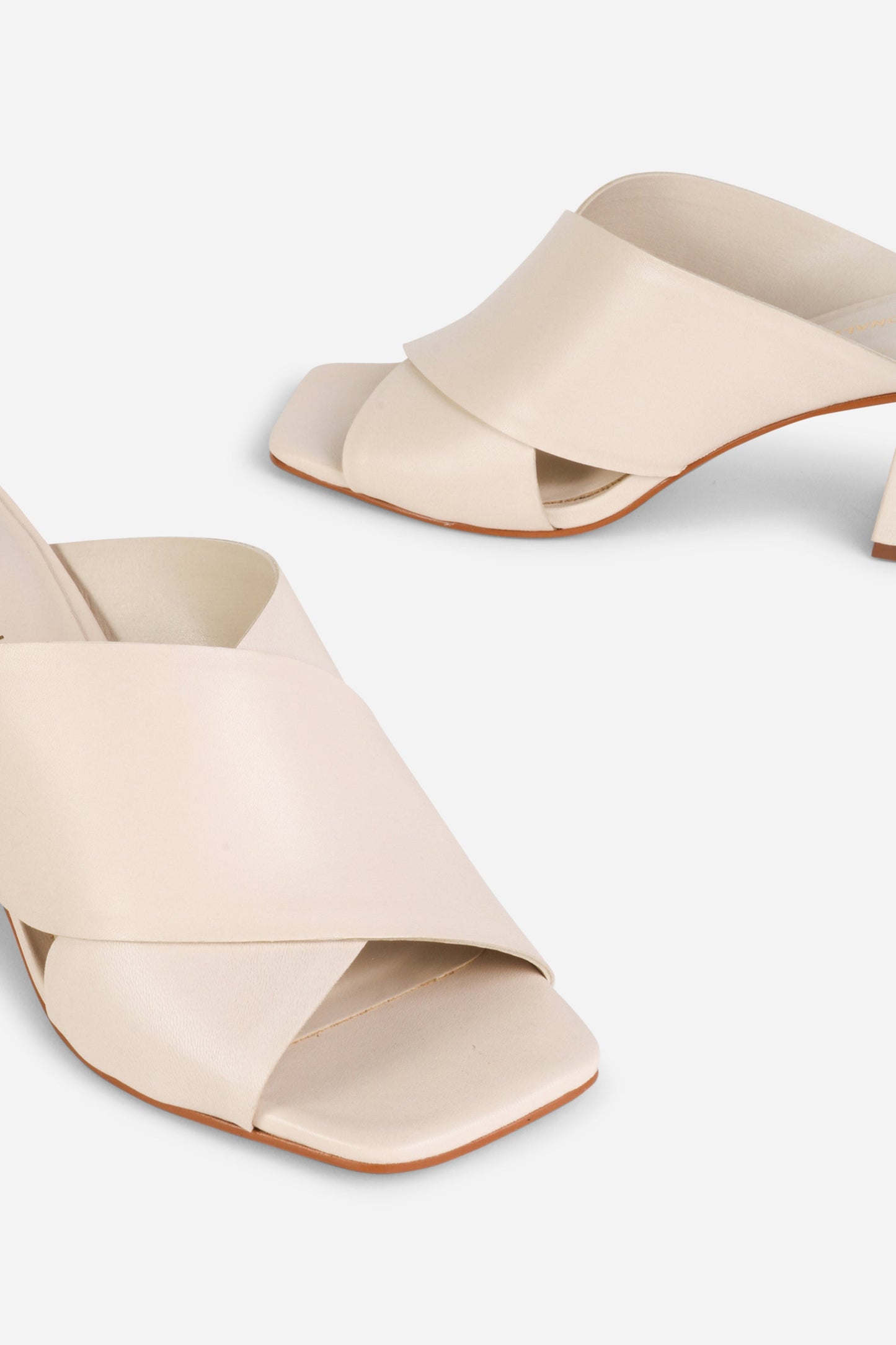 Intentionally Blank LEFTY MULE HEEL