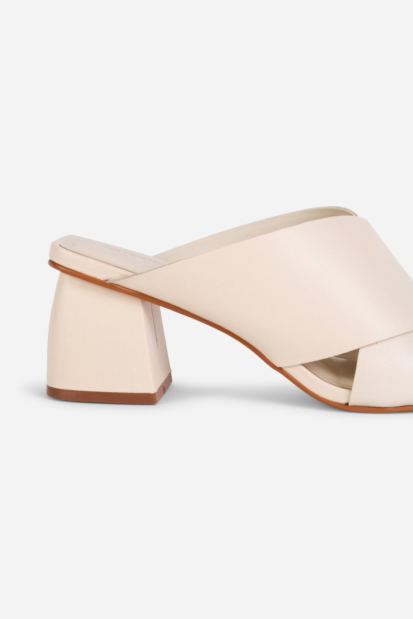 Intentionally Blank LEFTY MULE HEEL