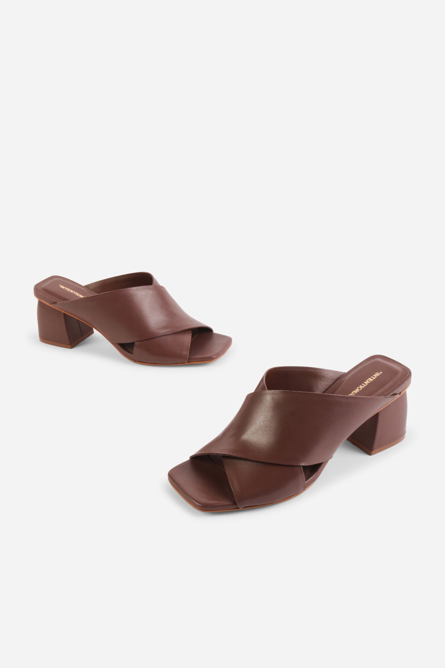 Intentionally Blank LEFTY MULE HEEL