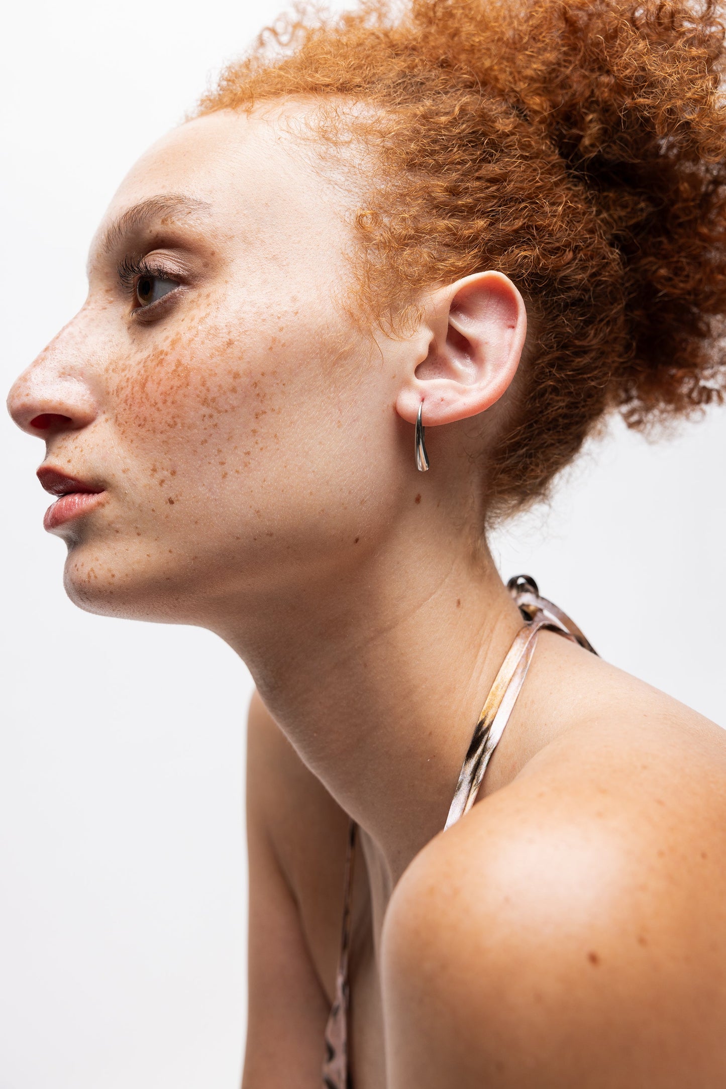 Intentionally Blank AFEX OPEN EARRING