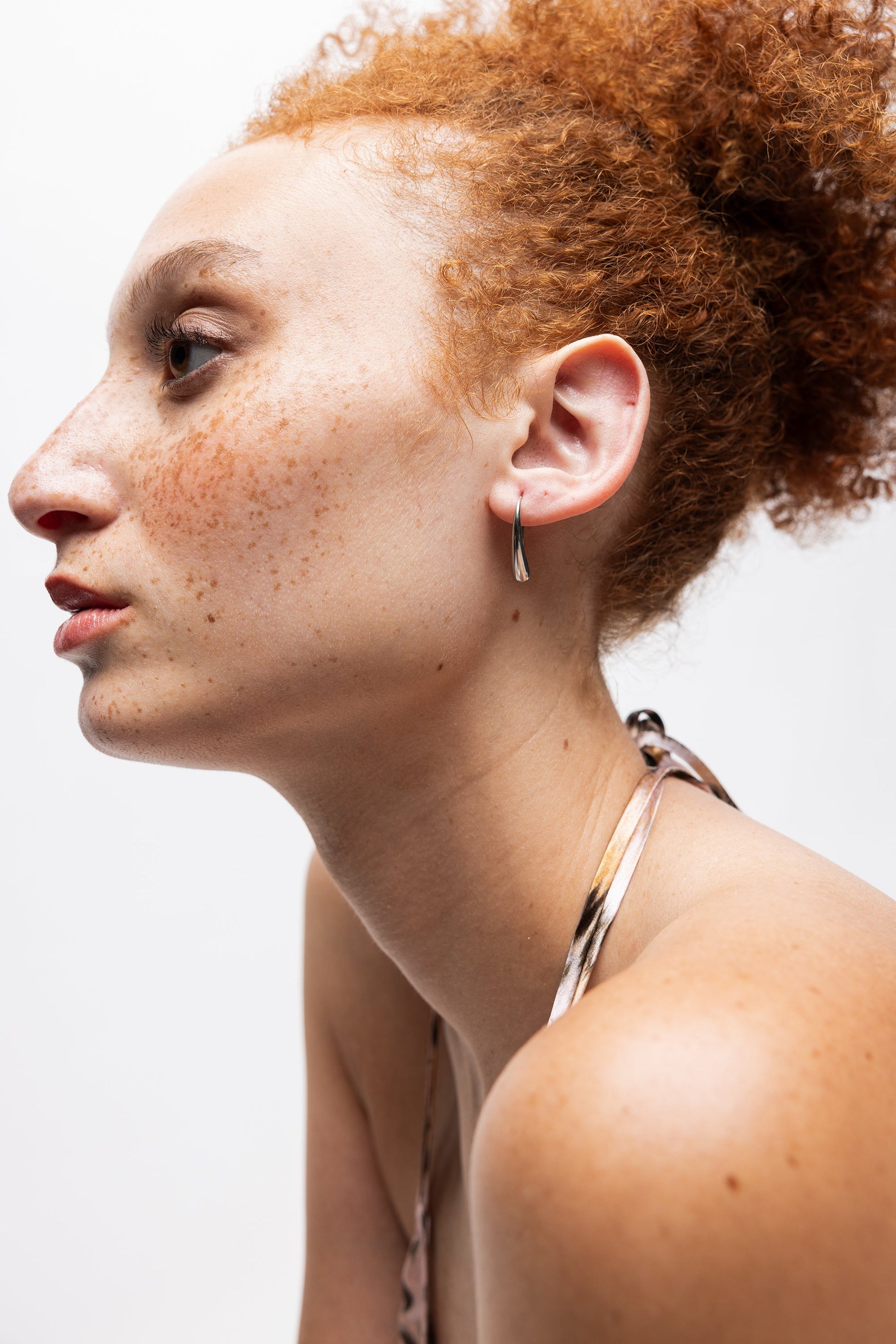 Intentionally Blank AFEX OPEN EARRING