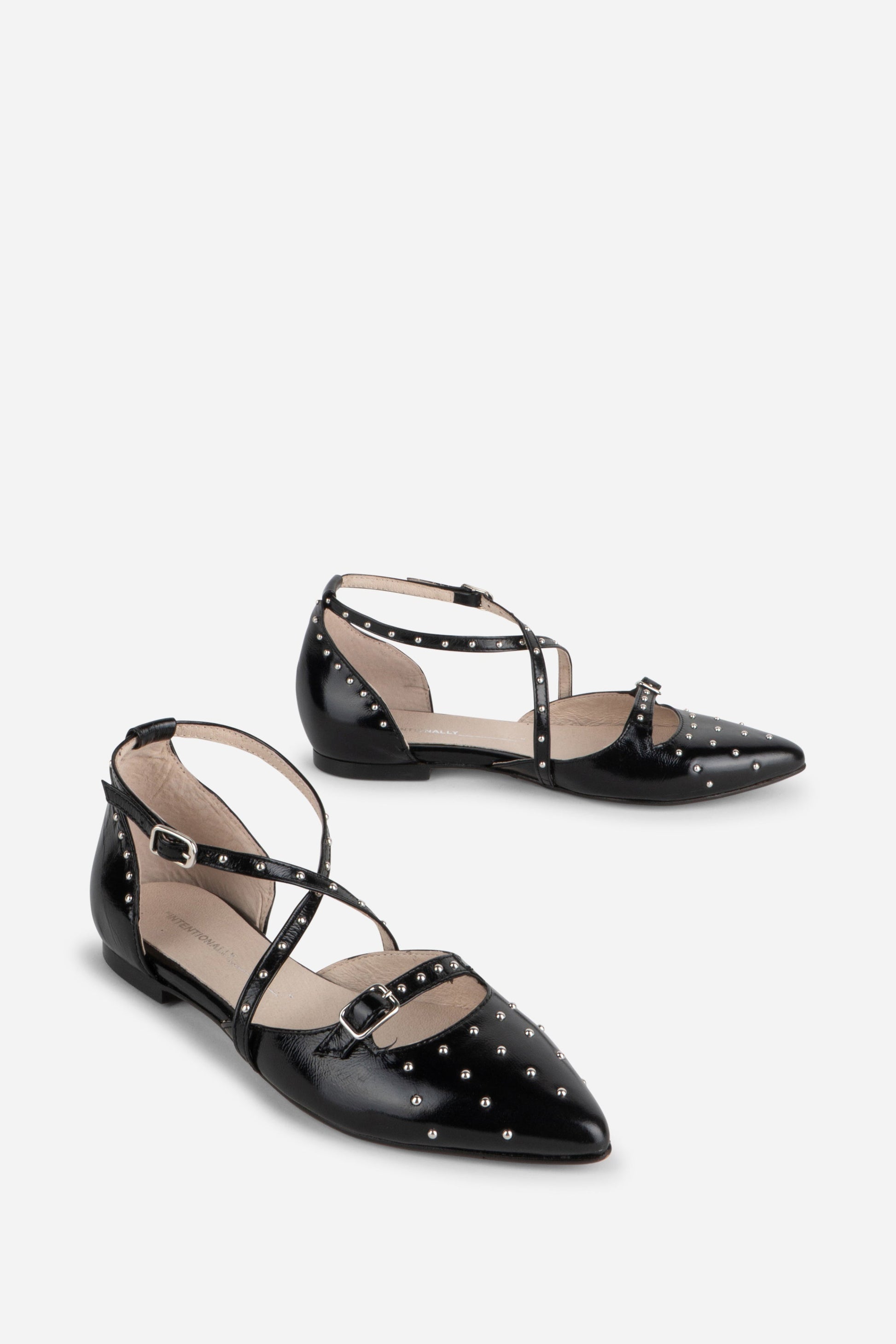 Intentionally Blank CROWD STUDDED CRISS CROSS FLAT