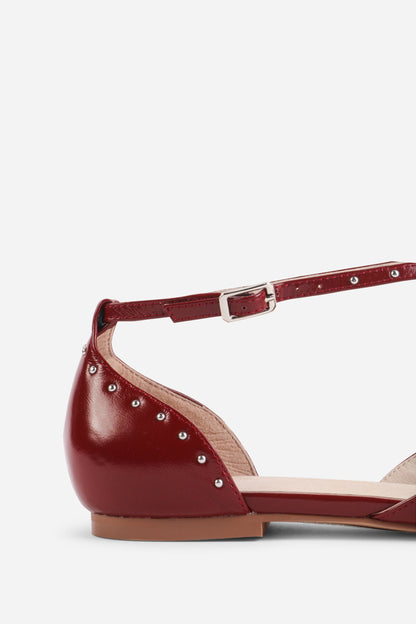 Intentionally Blank CROWD STUDDED CRISS CROSS FLAT