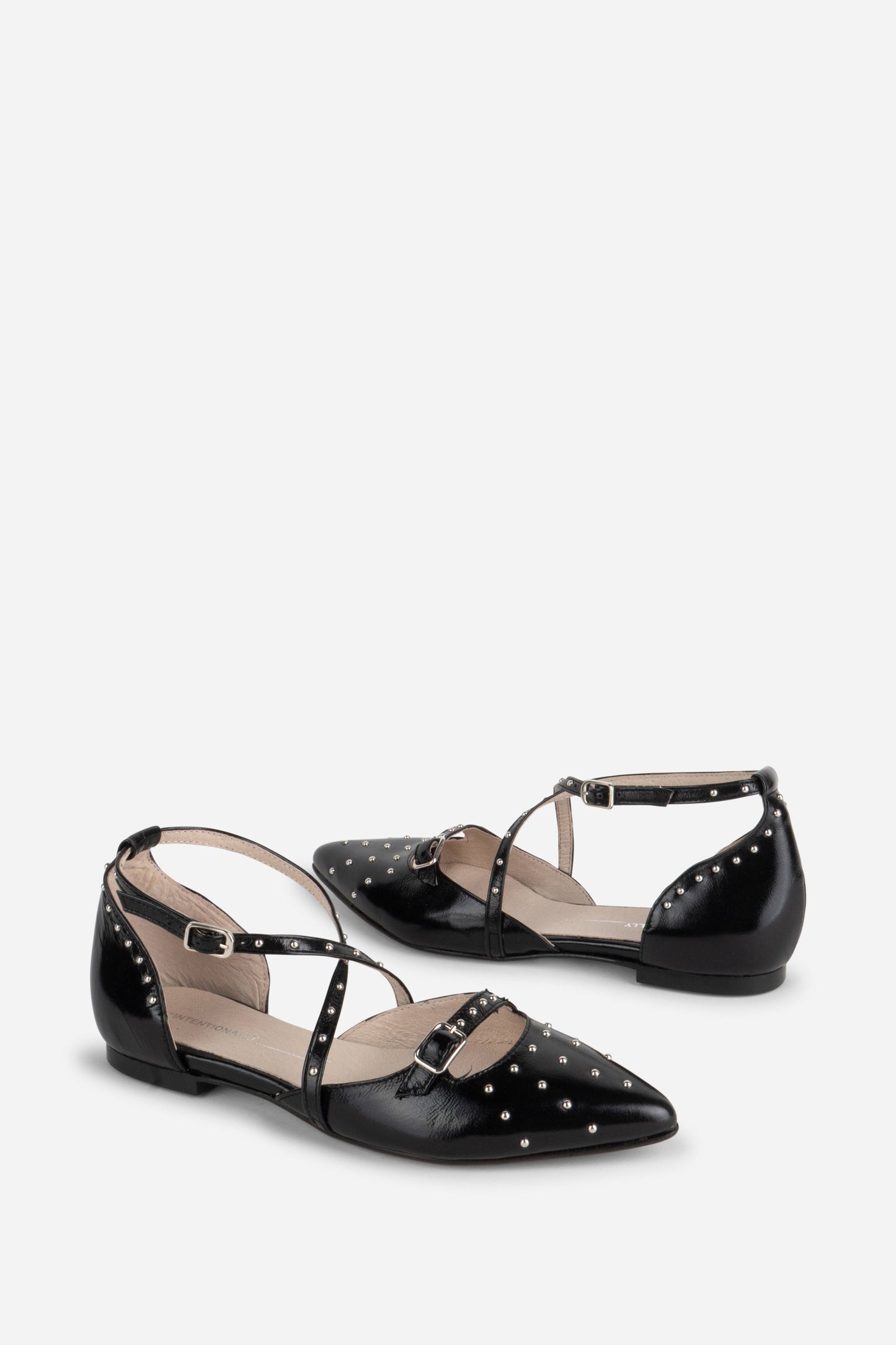 Intentionally Blank CROWD STUDDED CRISS CROSS FLAT