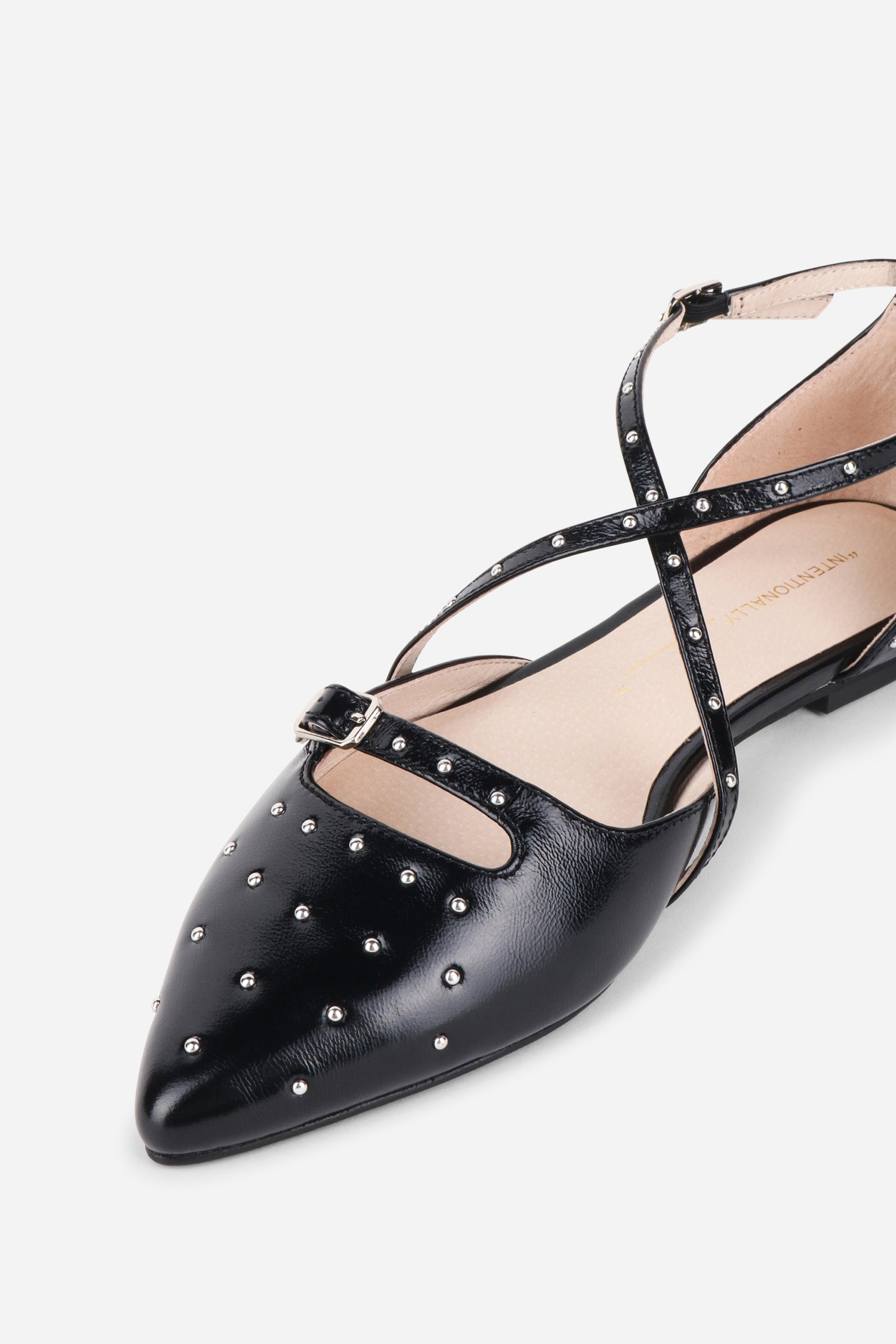 Intentionally Blank CROWD STUDDED CRISS CROSS FLAT