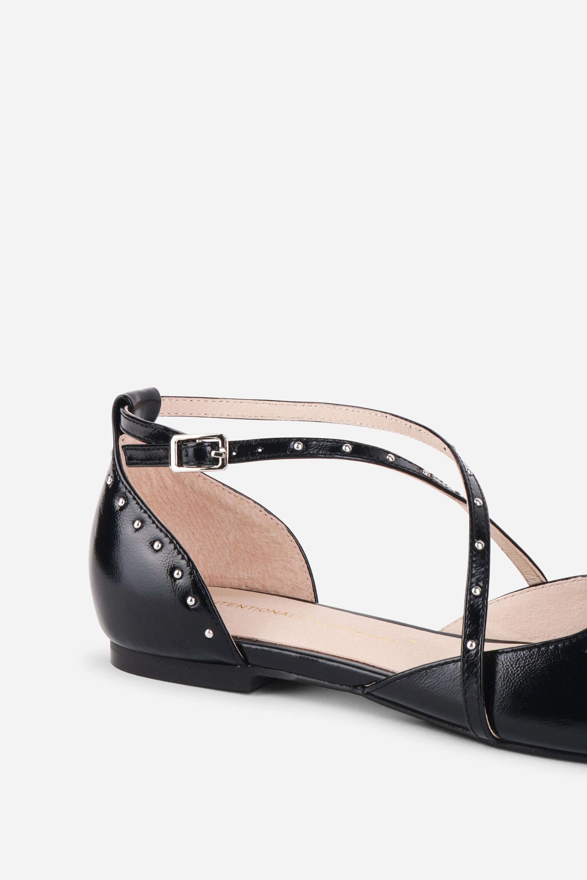 Intentionally Blank CROWD STUDDED CRISS CROSS FLAT