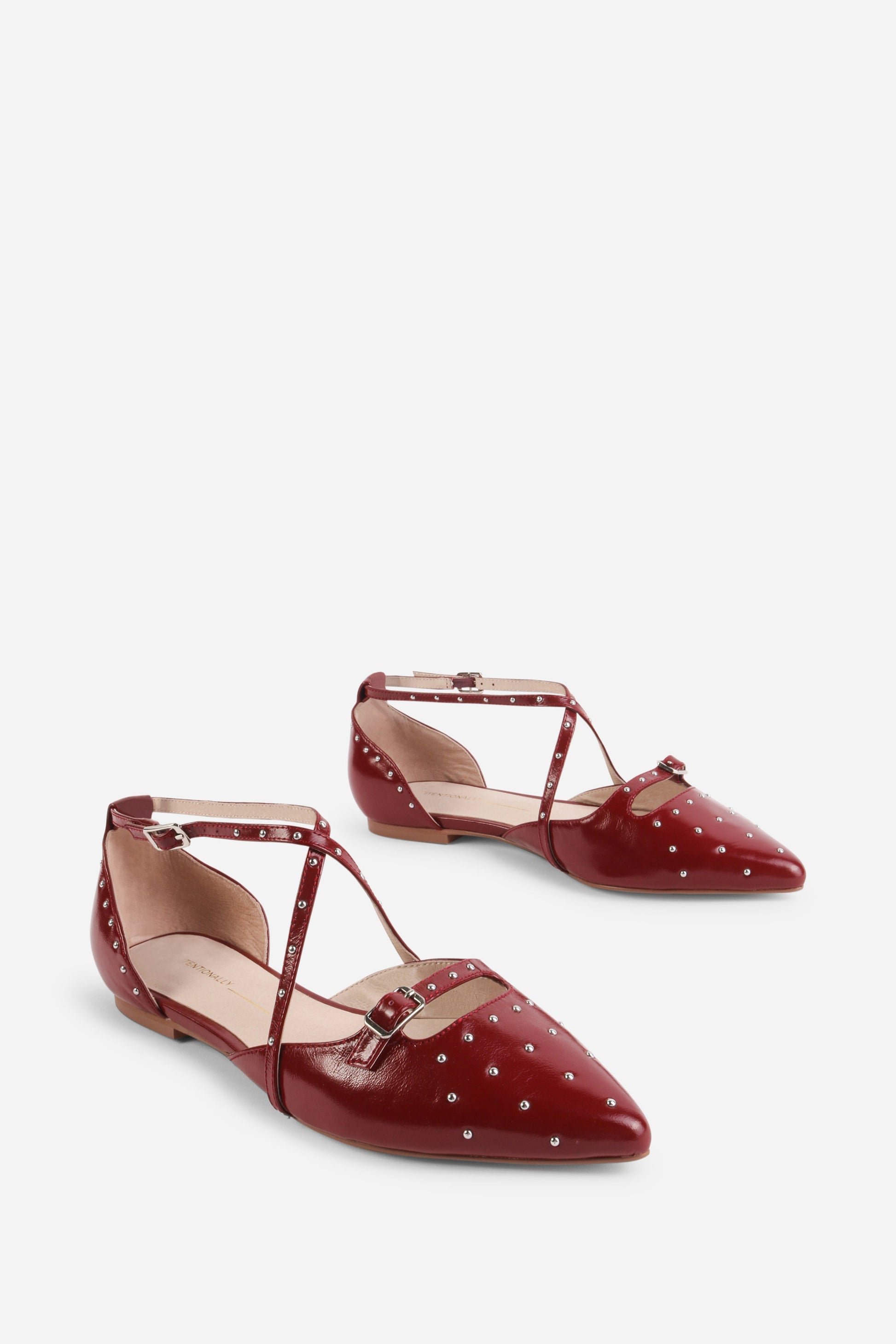 Intentionally Blank CROWD STUDDED CRISS CROSS FLAT