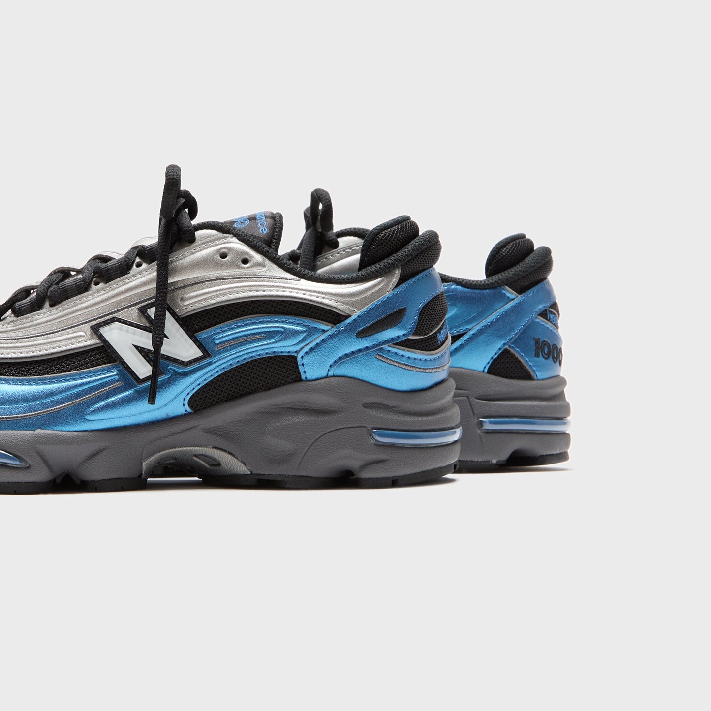 Men|Women Kith New Balance M1000 - Metallic Blue