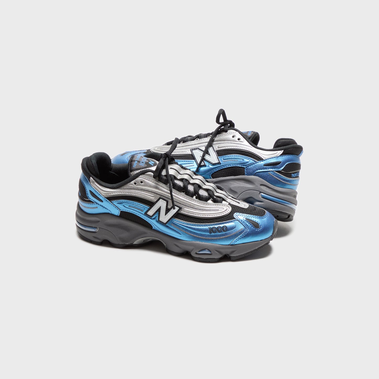 Men|Women Kith New Balance M1000 - Metallic Blue