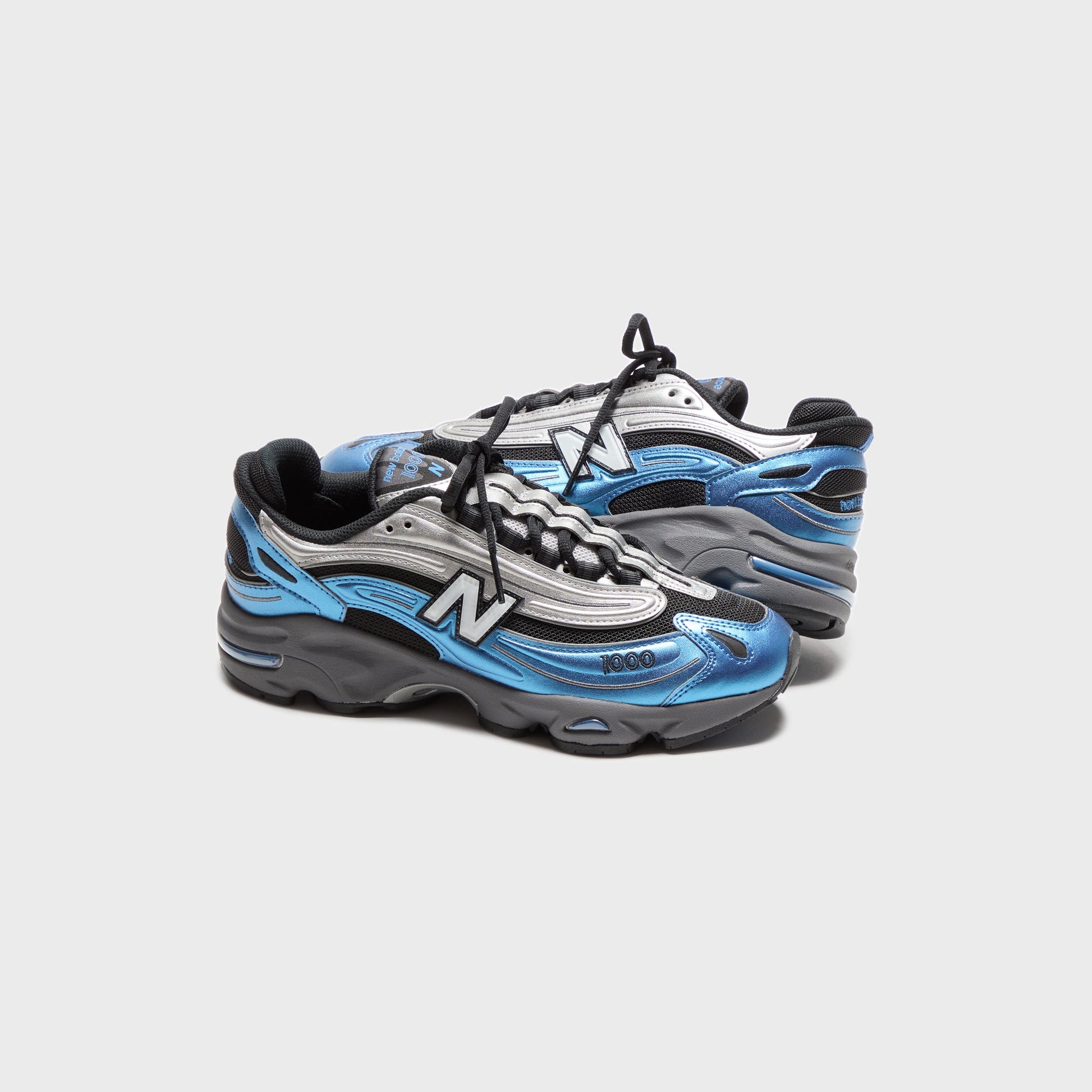 Men|Women Kith New Balance M1000 - Metallic Blue
