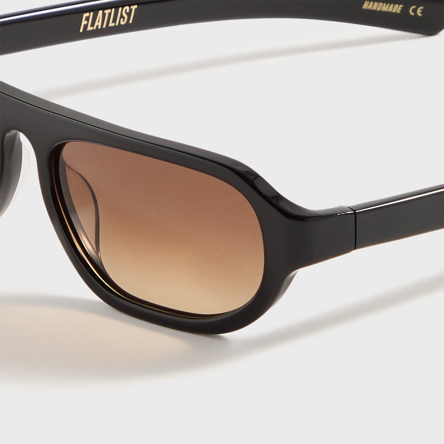 Men Kith Flatlist Penn - Solid Black / Brown Gradient Lens